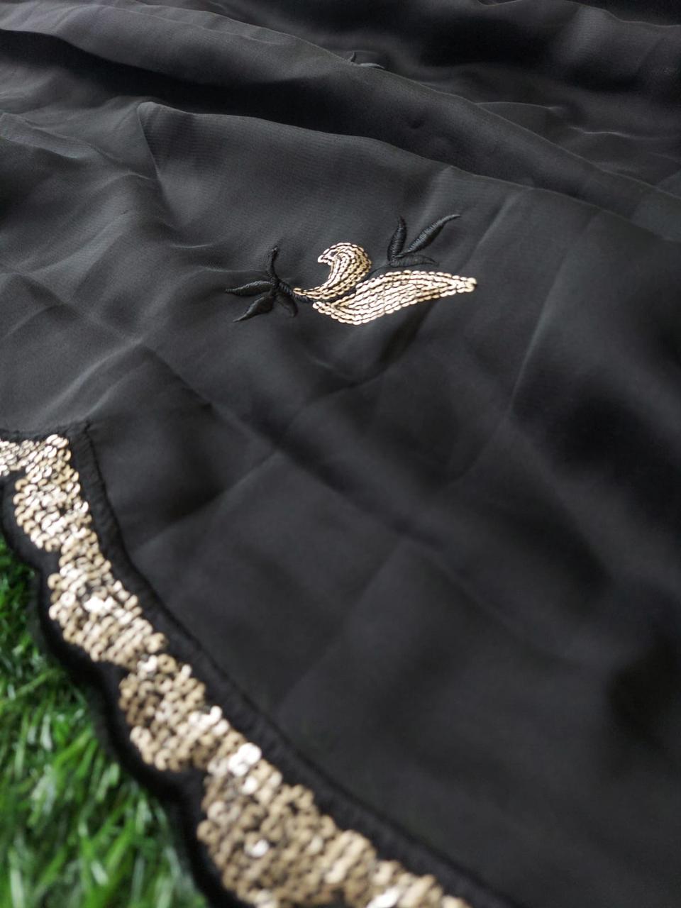 🌟 Elevate your ethnic wardrobe with our Heavy Rangoli Silk Black Saree! 🌟