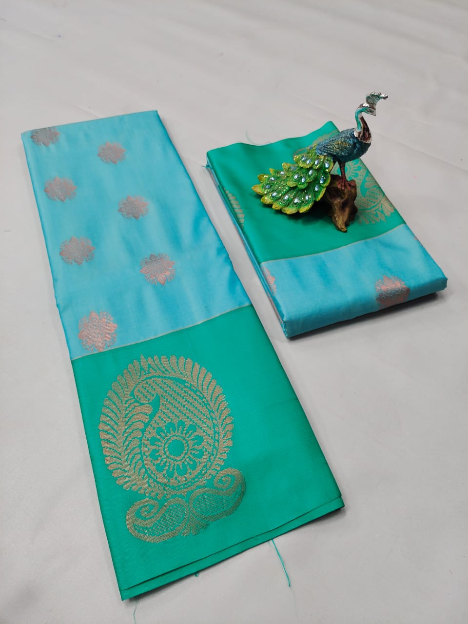 Elegance with Rich Bhutta Work Embosed Silk Sarees